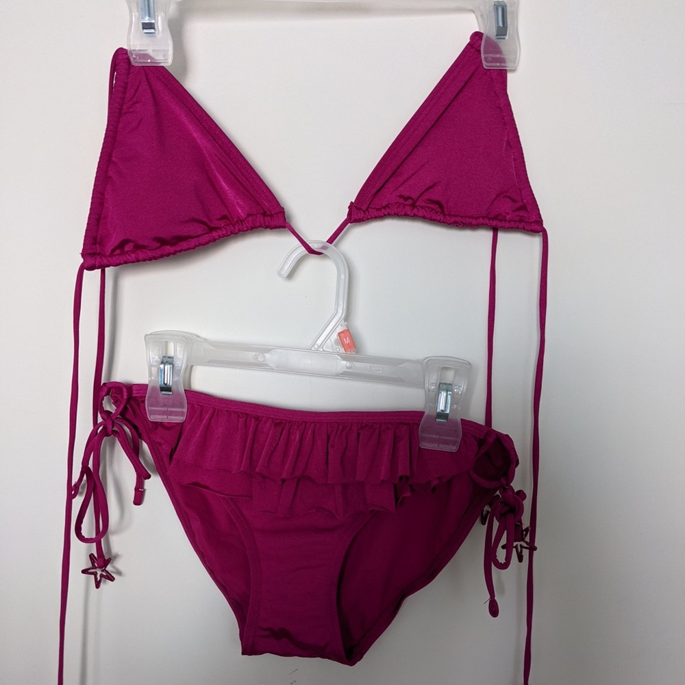 Marc Jacobs pink swimsuit size small top have padding. One star is missing
